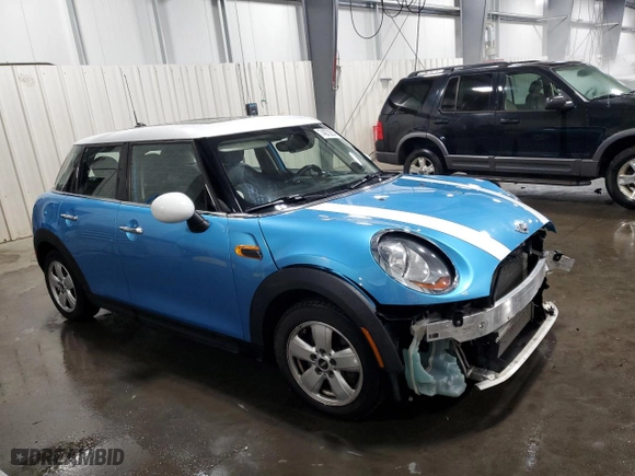 2015 MINI Cooper Hardtop 4 Door with VIN WMWXS5C53FT832241, listed as a Copart auction lot 74073854 with 100,895 mi miles and Salvage Title. Bid and sale history available at carsss.com. Image 4.