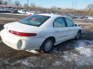1997 Mercury Sable GS with VIN 1MELM50U6VA657452, listed as a IAAI auction lot 41415751 with 185,235 mi miles. Bid and sale history available at carsss.com. Image 4.