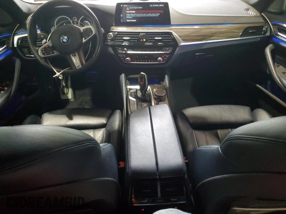 2018 BMW 5 Series 540i xDrive with VIN WBAJE7C53JWC54662, listed as a Copart auction lot 63703595 with 96,523 mi miles and Salvage title. Bid and sale history available at DreamBid. Image 8.