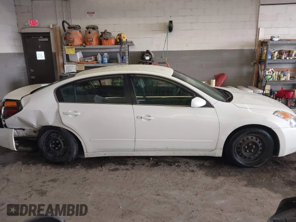2009 Nissan Altima S z VIN 1N4AL21E59N477966, wystawiony jako IAAI lot #42190062 z przebiegiem 171 127 mil mil oraz . Historia ofert i sprzedaży dostępna na DreamBid. Obrazek 14.