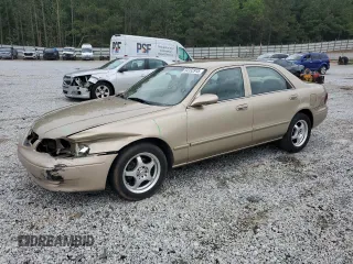 2001 Mazda 626 LX z VIN 1YVGF22C715202574, wystawiony jako Copart lot #54132915 z przebiegiem 237 041 mil mil oraz Szkody całkowita. Historia ofert i sprzedaży dostępna na DreamBid. Obrazek 1.