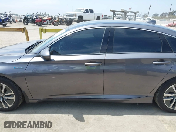 2020 Honda Accord with VIN 1HGCV3F11LA015901, listed as a IAAI auction lot 42022659 with 131,865 mi miles and . Bid and sale history available at DreamBid. Image 14.