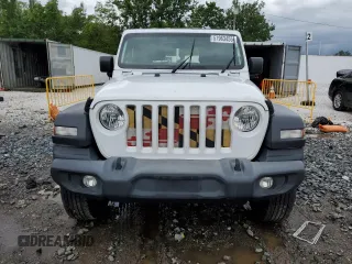 2019 Jeep Wrangler Sport S with VIN 1C4GJXAG0KW608696, listed as a Copart auction lot 57963455 with 51,955 mi miles and Salvage title. Bid and sale history available at DreamBid. Image 5.