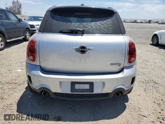2013 MINI Countryman S with VIN WMWZC3C58DWP20864, listed as a Copart auction lot 64034385 with 72,487 mi miles and Clean title. Bid and sale history available at DreamBid. Image 6.