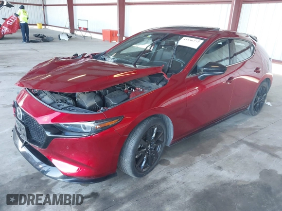 2021 Mazda 3 Premium Plus z VIN JM1BPBNY3M1332643, wystawiony jako IAAI lot #41536777 z przebiegiem 43 075 mil mil oraz . Historia ofert i sprzedaży dostępna na DreamBid. Obrazek 2.