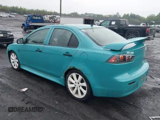 2013 Mitsubishi Lancer GT with VIN JA32U8FW6DU022878, listed as a IAAI auction lot 42449708 with 121,869 mi miles and . Bid and sale history available at DreamBid. Image 3.