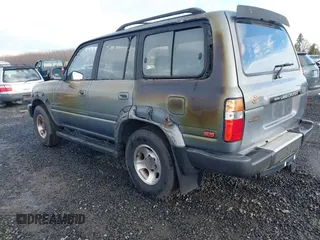 1995 Toyota Land Cruiser z VIN JT3DJ81W0S0094999, wystawiony jako IAAI lot #41583748 z przebiegiem 93 454 mil mil oraz . Historia ofert i sprzedaży dostępna na DreamBid. Obrazek 3.