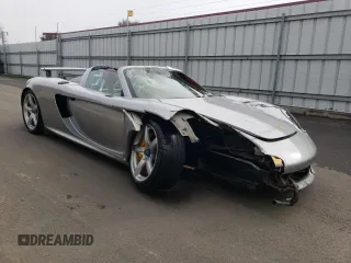 2004 Porsche Carrera GT z VIN WP0CA29894L001019, wystawiony jako Copart lot #52988584 z przebiegiem 4486 mil mil oraz Szkody całkowita. Historia ofert i sprzedaży dostępna na DreamBid. Obrazek 4.
