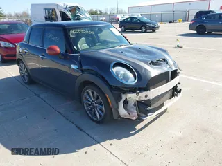 2015 MINI Hardtop 4 Door S z VIN WMWXU3C57FT892179, wystawiony jako IAAI lot #42092010 z przebiegiem 95 156 mil mil oraz . Historia ofert i sprzedaży dostępna na DreamBid. Obrazek 1.