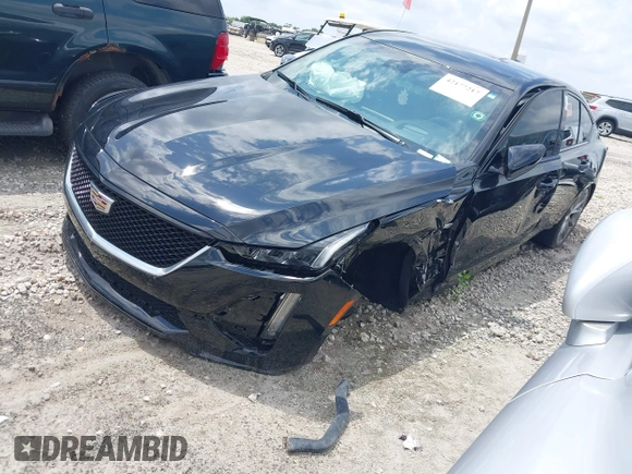 2020 Cadillac CT5 Sport z VIN 1G6DP5RK7L0154923, wystawiony jako IAAI lot #42177217 z przebiegiem 57 329 mil mil oraz . Historia ofert i sprzedaży dostępna na DreamBid. Obrazek 2.