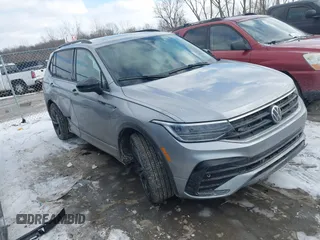 2023 Volkswagen Tiguan SE R-Line Black with VIN 3VV8B7AX3PM106873, listed as a IAAI auction lot 41402146 with 26,701 mi miles and . Bid and sale history available at DreamBid. Image 1.