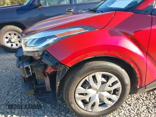 2020 Toyota C-HR LE with VIN JTNKHMBXXL1090061, listed as a IAAI auction lot 41124269 with 99,034 mi miles. Bid and sale history available at carsss.com. Image 6.