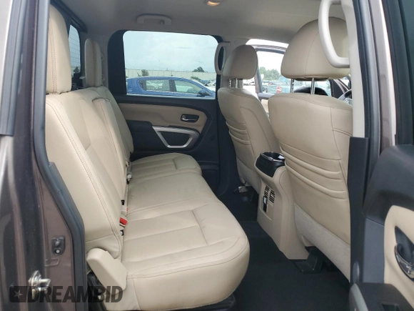 2017 Nissan Titan SV z VIN 1N6AA1E64HN517933, wystawiony jako Copart lot #72793864 z przebiegiem 60 572 mil mil oraz Szkoda całkowita • Salvage title. Historia ofert i sprzedaży dostępna na DreamBid. Obrazek 11.