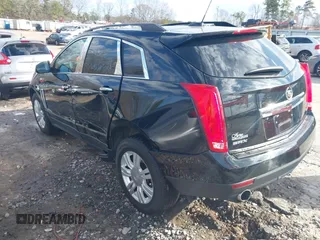 2015 Cadillac SRX with VIN 3GYFNAE38FS622913, listed as a IAAI auction lot 41590242 with 114,062 mi miles and . Bid and sale history available at DreamBid. Image 3.