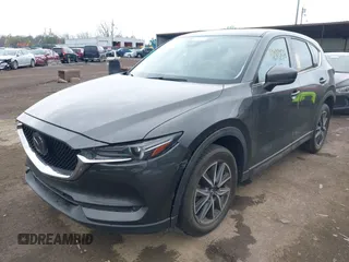 2017 Mazda CX-5 Grand Touring with VIN JM3KFBDL3H0143194, listed as a IAAI auction lot 42049258 with 74,159 mi miles. Bid and sale history available at carsss.com. Image 17.