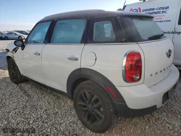 2013 MINI Cooper Countryman with VIN WMWZB3C5XDWR35519, listed as a Copart auction lot 82826894 with 89,832 mi miles and Salvage Title. Bid and sale history available at carsss.com. Image 2.