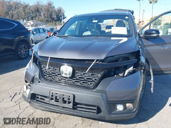 2019 Honda Passport EX-L with VIN 5FNYF7H58KB006501, listed as a IAAI auction lot 41752416 with 60,820 mi miles and . Bid and sale history available at carsss.com. Image 6.