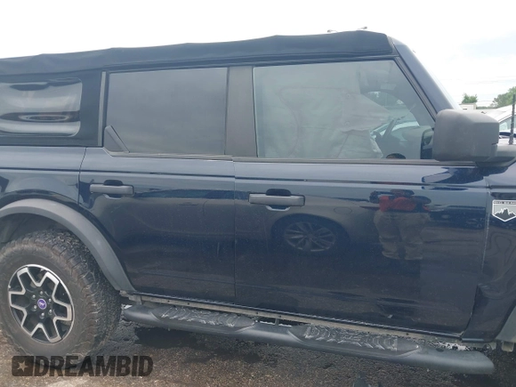 2021 Ford Bronco with VIN 1FMDE5BH2MLA85541, listed as a IAAI auction lot 42376748 with 53,724 mi miles and . Bid and sale history available at DreamBid. Image 14.