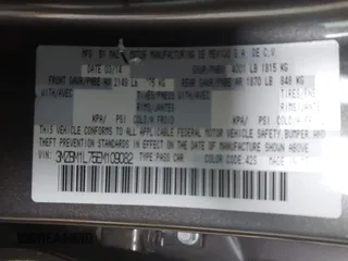 2014 Mazda 3 i Touring with VIN 3MZBM1L75EM109082, listed as a IAAI auction lot 41625740 with 123,618 mi miles. Bid and sale history available at carsss.com. Image 9.