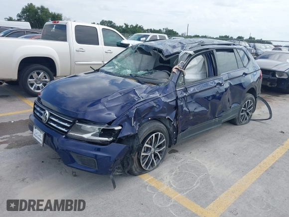 2021 Volkswagen Tiguan S with VIN 3VV1B7AX4MM150765, listed as a IAAI auction lot 42505134 with 19,590 mi miles and . Bid and sale history available at DreamBid. Image 2.