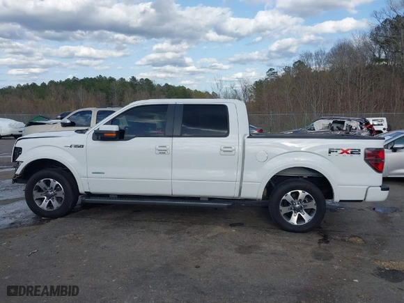 2011 Ford F-150 XLT with VIN 1FTFW1CTXBKE06928, listed as a IAAI auction lot 41718059 with 99,877 mi miles. Bid and sale history available at carsss.com. Image 15.