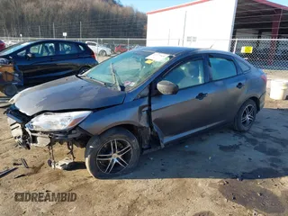 2013 Ford Focus S with VIN 1FADP3E23DL288244, listed as a IAAI auction lot 41777824 with 145,684 mi miles. Bid and sale history available at carsss.com. Image 18.