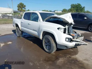 2017 Toyota Tacoma SR5 with VIN 5TFAZ5CNXHX044976, listed as a IAAI auction lot 42052922 with 149,116 mi miles. Bid and sale history available at carsss.com. Image 1.