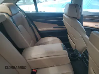 2011 BMW 7 Series 740i z VIN WBAKA4C51BC612517, wystawiony jako Copart lot #76987474 z przebiegiem Nie podano mil oraz Szkoda całkowita • Salvage title. Historia ofert i sprzedaży dostępna na DreamBid. Obrazek 10.