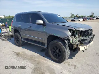 2010 Lexus GX 460 Premium with VIN JTJJM7FX5A5011762, listed as a Copart auction lot 56207715 with 185,360 mi miles and Salvage title. Bid and sale history available at DreamBid. Image 4.