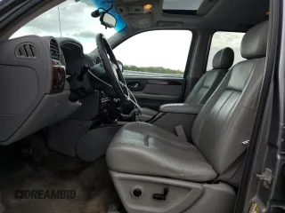 2005 GMC Envoy SLT with VIN 1GKDT13S952155528, listed as a Copart auction lot 76095784 with 212,458 mi miles and Clean Title. Bid and sale history available at carsss.com. Image 7.