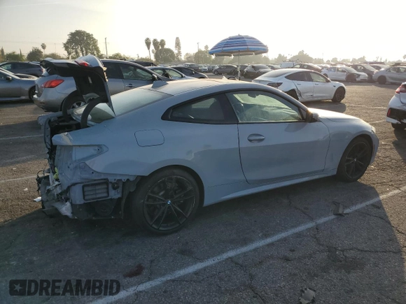 2022 BMW 4 Series 430i xDrive with VIN WBA73AP02NCK63692, listed as a Copart auction lot 84758794 with 21,484 mi miles and Salvage Title. Bid and sale history available at DreamBid. Image 3.