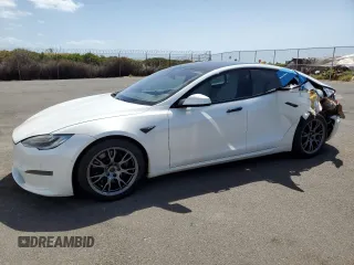 2021 Tesla Model S Plaid with VIN 5YJSA1E66MF453717, listed as a Copart auction lot 49330355 with 64,458 mi miles and Salvage title. Bid and sale history available at DreamBid. Image 1.
