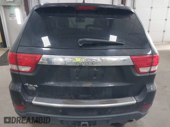 2013 Jeep Grand Cherokee Overland with VIN 1C4RJFCT7DC524005, listed as a IAAI auction lot 42116097 with 126,942 mi miles. Bid and sale history available at carsss.com. Image 16.