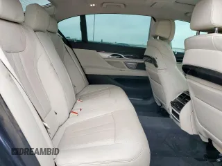 2018 BMW 7 Series 740i z VIN WBA7E2C50JG741970, wystawiony jako Copart lot #56480695 z przebiegiem 53 740 mil mil oraz Szkoda całkowita • Salvage title. Historia ofert i sprzedaży dostępna na DreamBid. Obrazek 10.