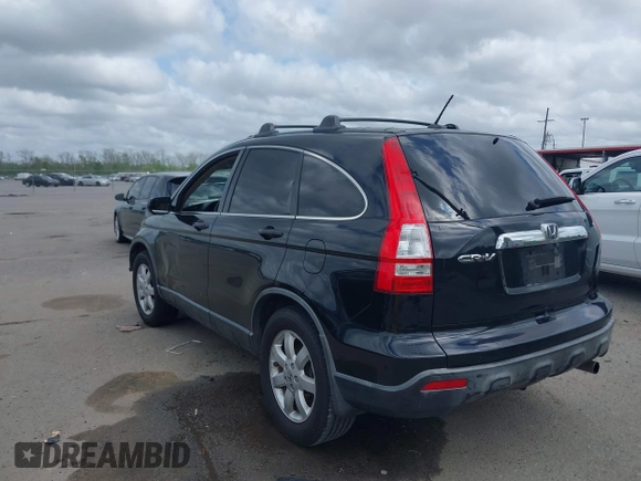 2007 Honda CR-V EX-L with VIN JHLRE38717C038957, listed as a IAAI auction lot 41935050 with 209,807 mi miles and . Bid and sale history available at carsss.com. Image 3.