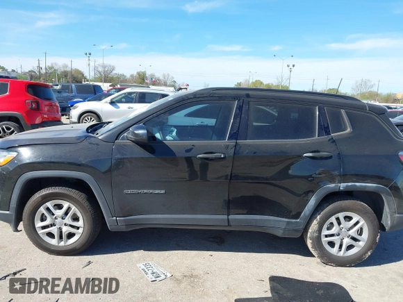 2018 Jeep Compass Sport with VIN 3C4NJCABXJT214907, listed as a IAAI auction lot 41814215 with 96,111 mi miles and . Bid and sale history available at DreamBid. Image 14.