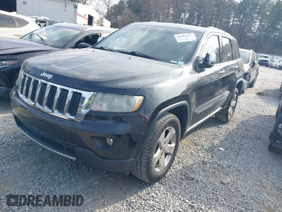 2013 Jeep Grand Cherokee Limited with VIN 1C4RJEBGXDC520609, listed as a IAAI auction lot 41493503 with 173,020 mi miles. Bid and sale history available at carsss.com. Image 17.
