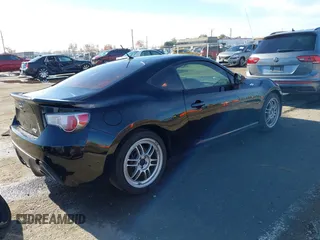 2014 Scion FR-S z VIN JF1ZNAA18E9700718, wystawiony jako IAAI lot #40958319 z przebiegiem 104 010 mil mil oraz . Historia ofert i sprzedaży dostępna na DreamBid. Obrazek 4.