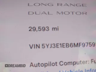 2021 Tesla Model 3 Long Range with VIN 5YJ3E1EB6MF975916, listed as a IAAI auction lot 40713749 with 29,593 mi miles and . Bid and sale history available at DreamBid. Image 14.