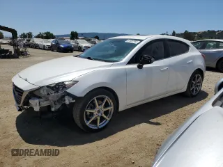 2016 Mazda 3 S Touring with VIN JM1BM1M32G1355182, listed as a Copart auction lot 61582365 with 144,159 mi miles and Salvage title. Bid and sale history available at DreamBid. Image 1.