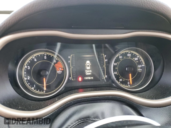 2017 Jeep Cherokee Latitude z VIN 1C4PJMCB3HW602710, wystawiony jako Copart lot #59660665 z przebiegiem 119 158 mil mil oraz Szkoda całkowita • Salvage title. Historia ofert i sprzedaży dostępna na DreamBid. Obrazek 9.