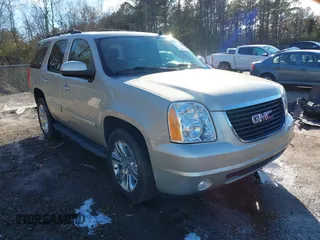 2014 GMC Yukon SLT with VIN 1GKS1CE03ER115330, listed as a IAAI auction lot 41346200 with 115,010 mi miles. Bid and sale history available at carsss.com. Image 1.