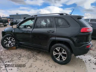 2014 Jeep Cherokee Trailhawk with VIN 1C4PJMBS1EW211570, listed as a Copart auction lot 51465845 with 156,320 mi miles and Salvage Title. Bid and sale history available at carsss.com. Image 2.