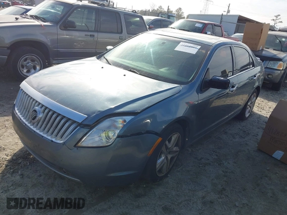 2011 Mercury Milan with VIN 3MEHM0HA2BR601822, listed as a IAAI auction lot 41282889 with 214,389 mi miles. Bid and sale history available at carsss.com. Image 2.