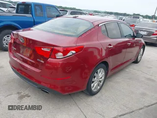 2014 Kia Optima EX z VIN 5XXGN4A71EG284280, wystawiony jako IAAI lot #42278795 z przebiegiem 179 200 mil mil oraz . Historia ofert i sprzedaży dostępna na DreamBid. Obrazek 4.