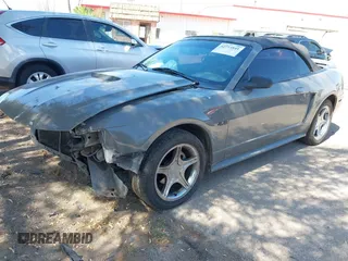 1999 Ford Mustang GT z VIN 1FAFP45X4XF117368, wystawiony jako IAAI lot #42714841 z przebiegiem 135 368 mil mil oraz . Historia ofert i sprzedaży dostępna na DreamBid. Obrazek 2.
