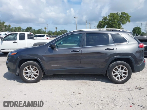 2016 Jeep Cherokee Latitude z VIN 1C4PJMCS1GW367447, wystawiony jako IAAI lot #42367643 z przebiegiem 151 072 mil mil oraz . Historia ofert i sprzedaży dostępna na DreamBid. Obrazek 14.
