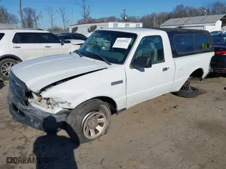 2009 Ford Ranger XL with VIN 1FTYR10DX9PA03395, listed as a IAAI auction lot 41103826 with 124,257 mi miles. Bid and sale history available at carsss.com. Image 2.