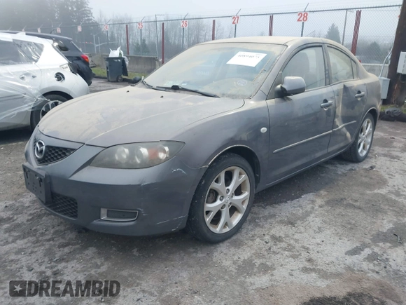 2009 Mazda Mazda3 i Touring Value with VIN JM1BK32G291214834, listed as a IAAI auction lot 40894075 with 128,040 mi miles. Bid and sale history available at carsss.com. Image 2.