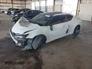 2015 Scion tC z VIN JTKJF5C70FJ003274, wystawiony jako Copart lot #53675415 z przebiegiem 83 326 mil mil oraz Szkoda całkowita • Salvage title. Historia ofert i sprzedaży dostępna na DreamBid. Obrazek 1.